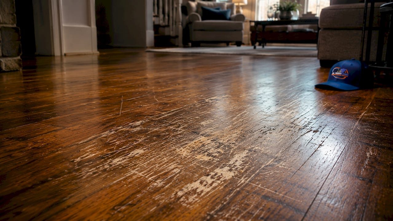 Close-up of worn scratched hardwood floor