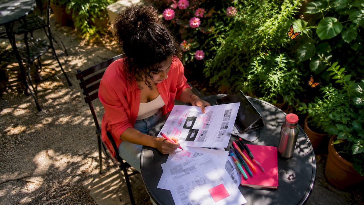 Marketing specialist reviewing digital content drafts
