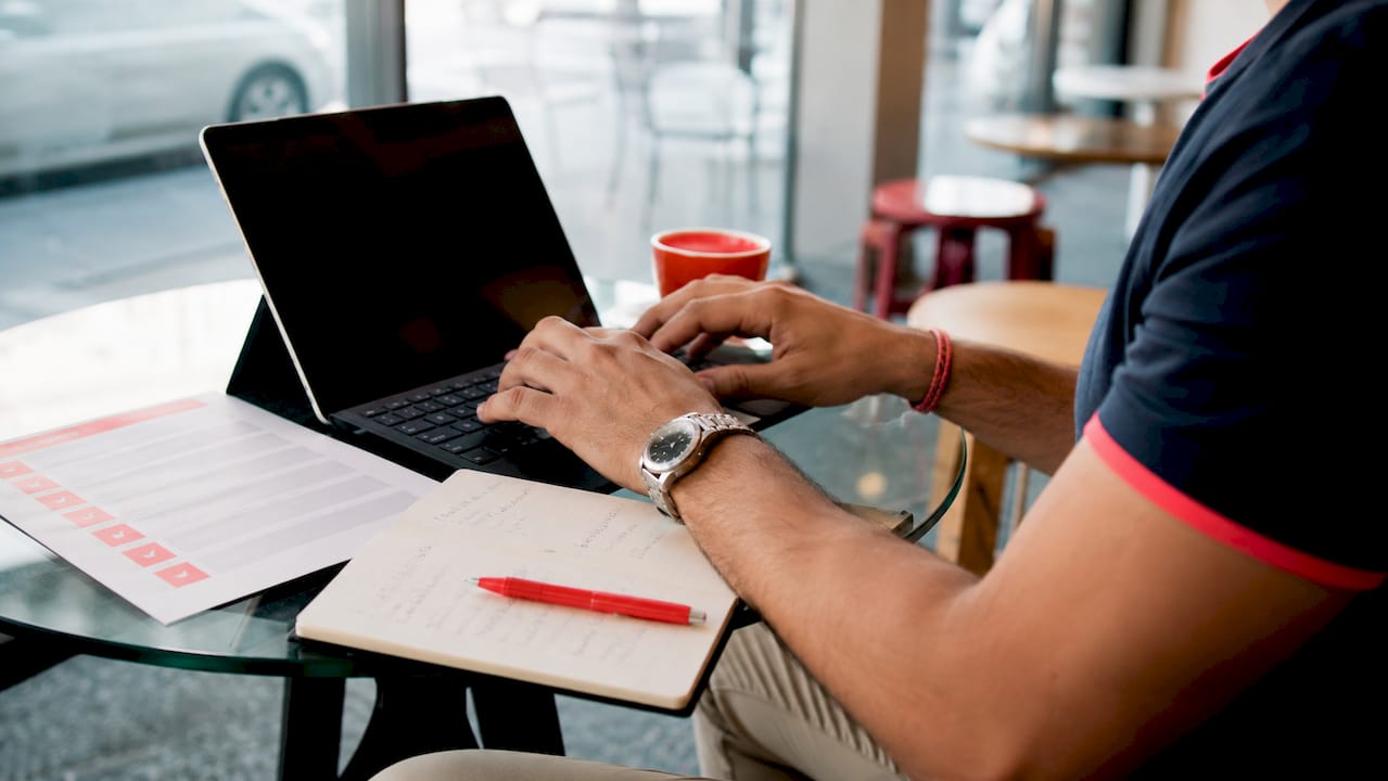 Hands typing checkout optimization checklist