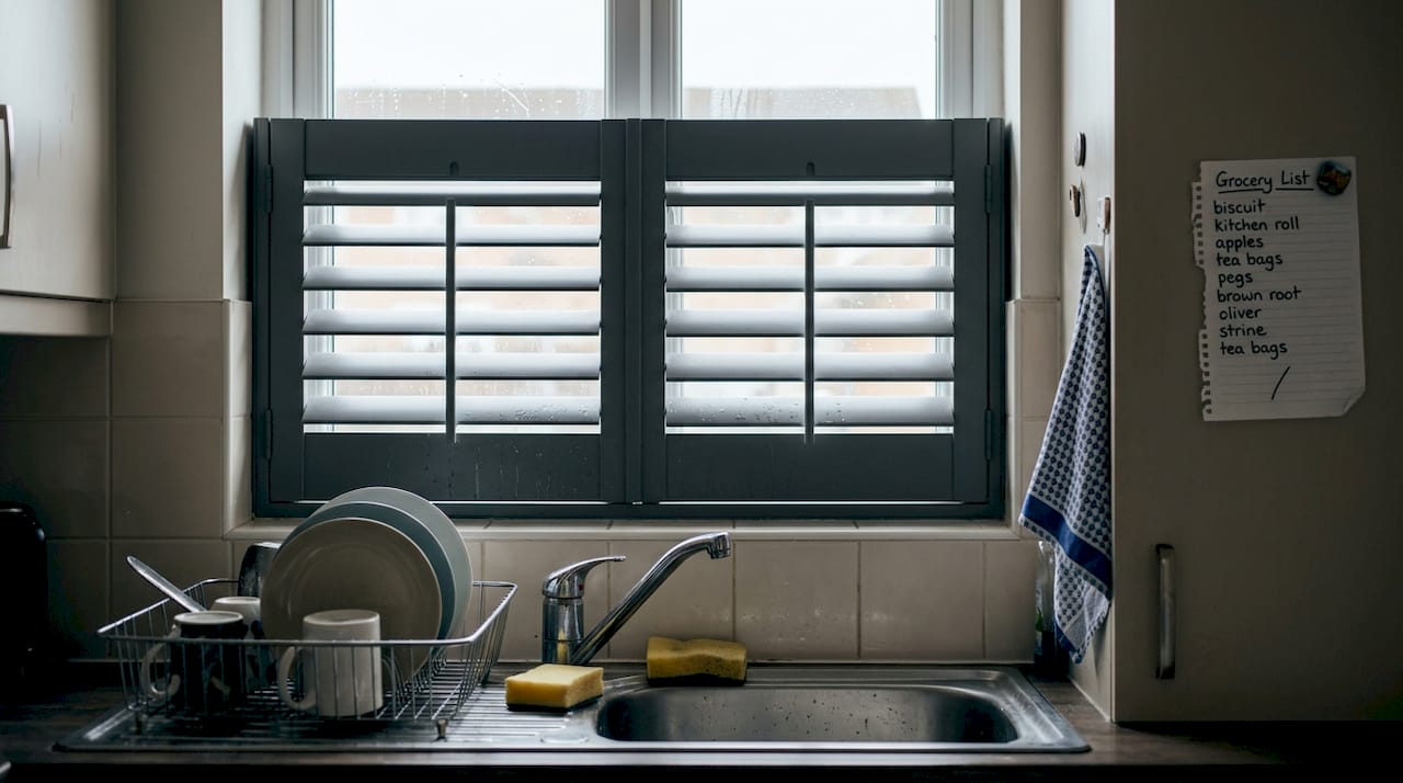 aluminium plantation shutters Aluminium shutters above kitchen sink with details
