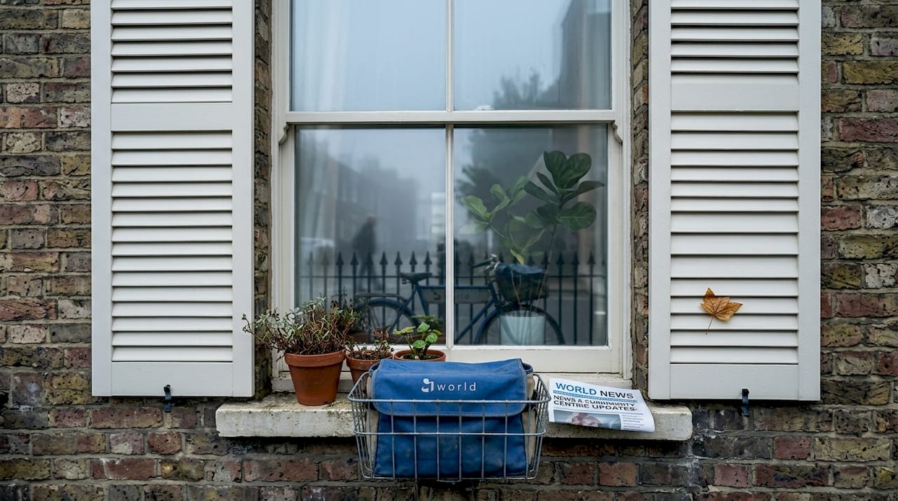 Rain on polycarbonate shutters protecting window