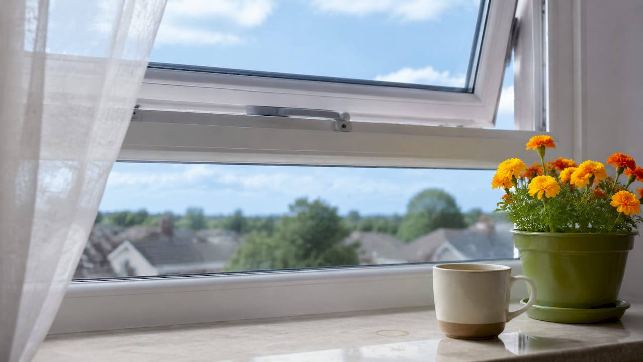 Close-up of open trickle vent on window frame