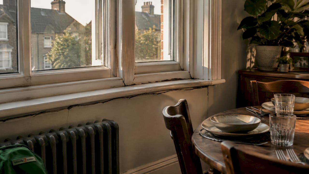 Close-up of window sill revealing leakage gaps