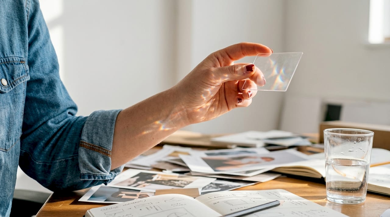 Designer demonstrates plastic card transparency