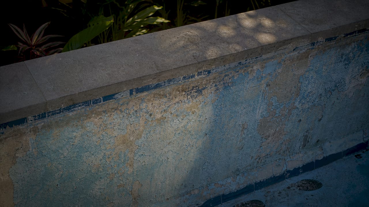 Close-up of pool surface aging damage