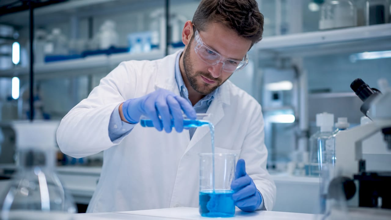 Scientist handling eco refrigerant in lab