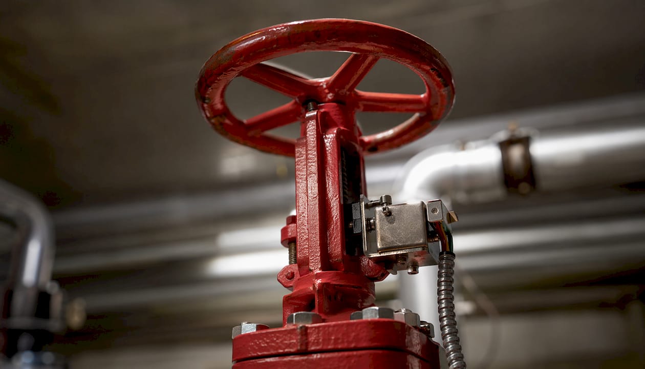 Close-up of tamper switch on sprinkler valve