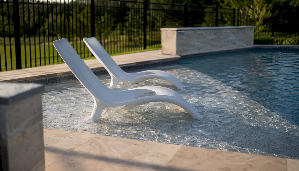 Pool Bench Seating Options: Best Choices for Homeowners 1 Removable in-pool chairs on tanning ledge