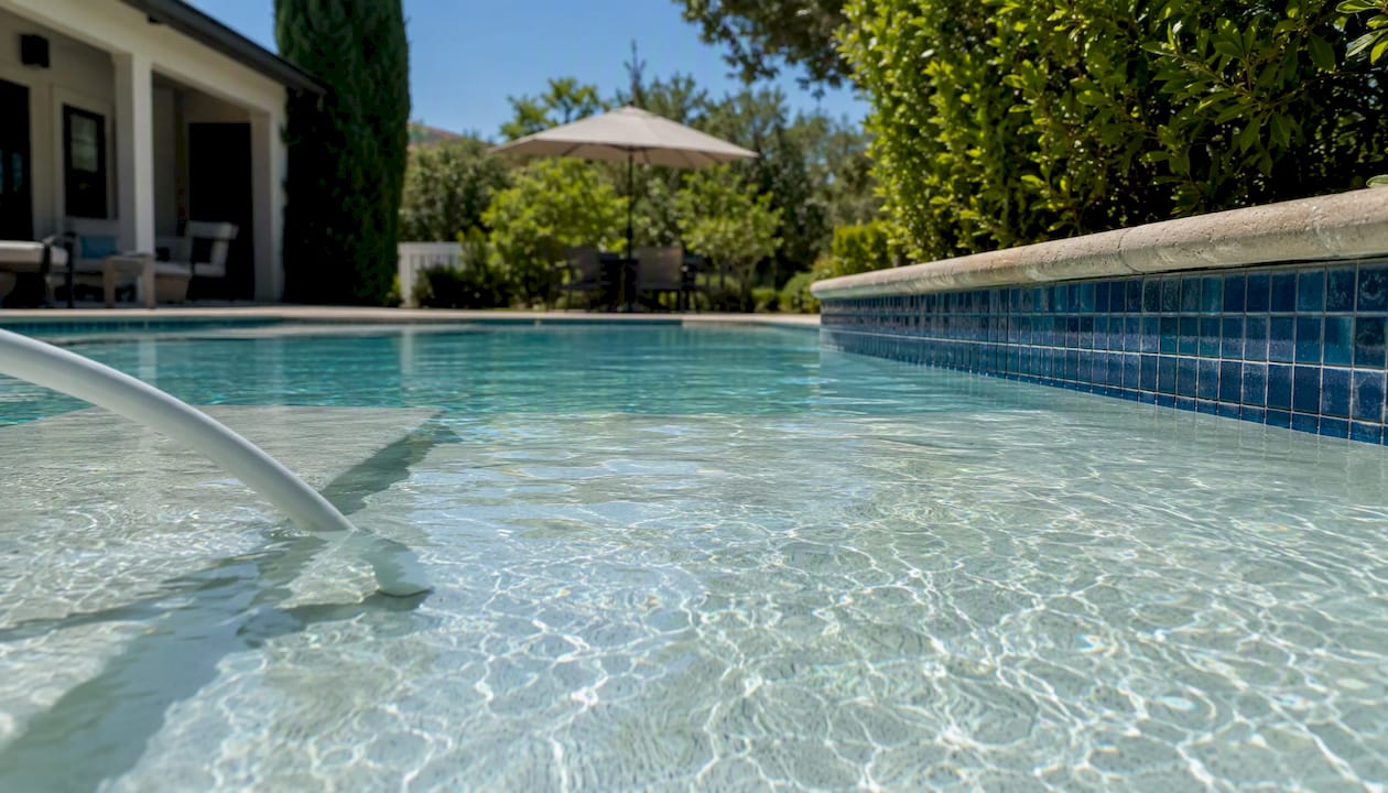 Family Pool Depth: What Every Homeowner Should Know 2 Pool sun shelf shallow lounging area