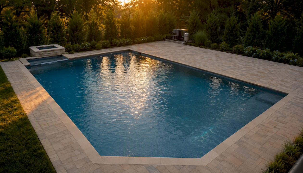 Family Pool Depth: What Every Homeowner Should Know 3 Aerial view of backyard pool water volume