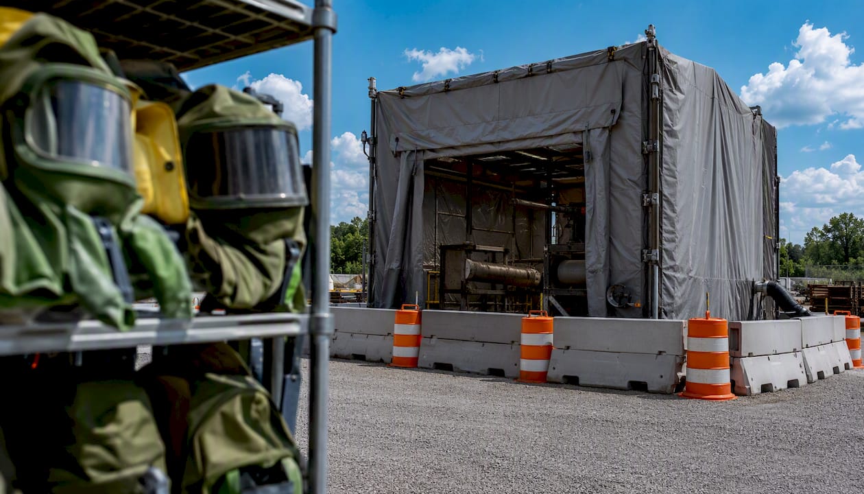 Abrasive blasting containment and ventilation setup