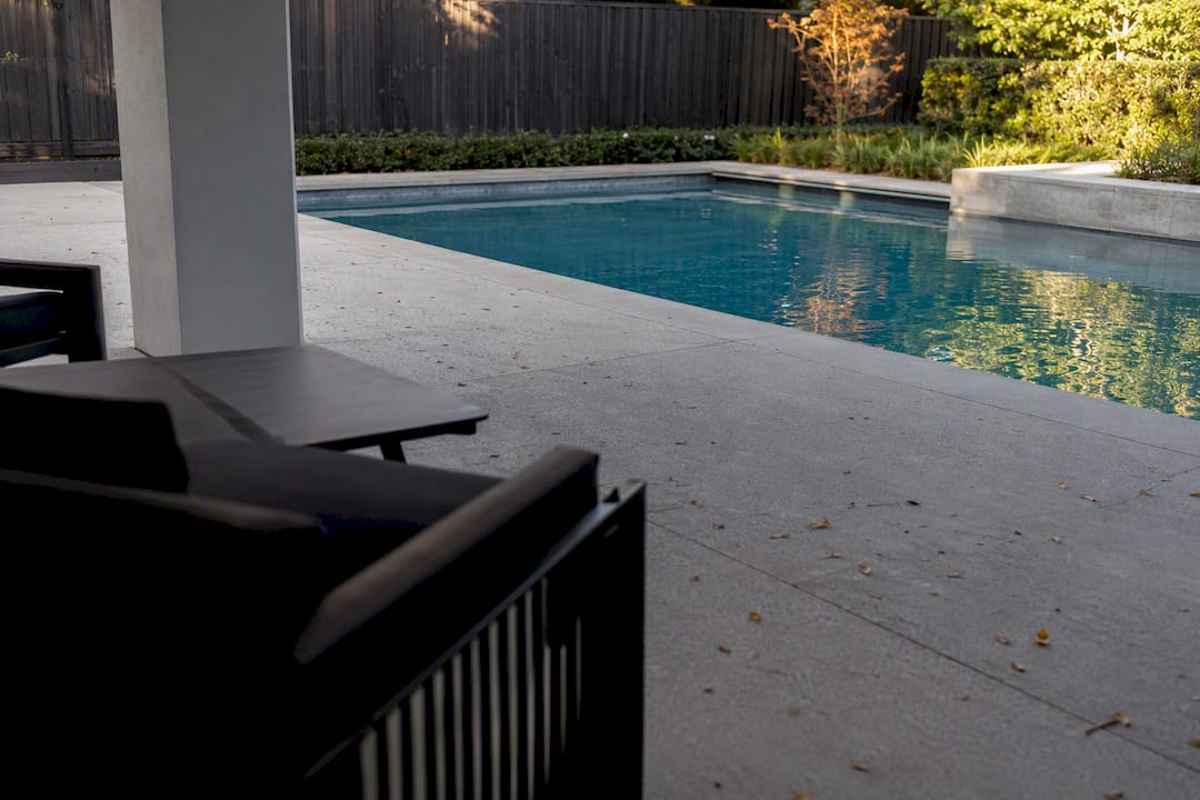 Small Backyard Pools: Sizes, Costs, and Design Ideas 1 Continuous decking flowing into small pool area