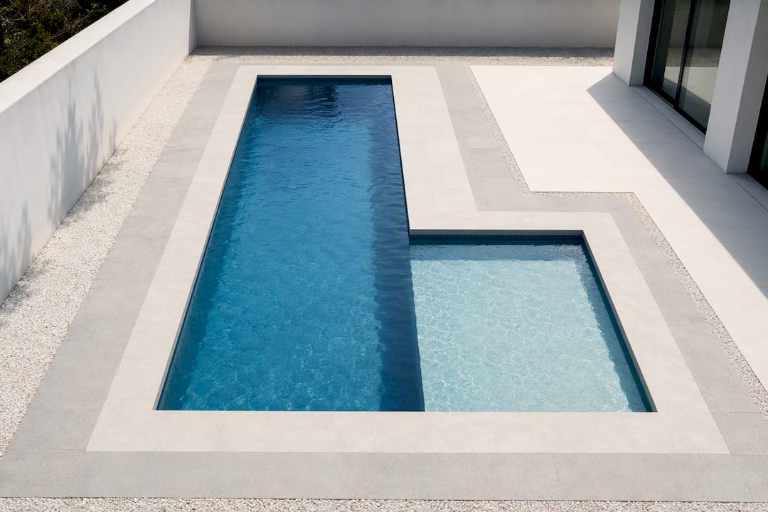 Lap Pool Dimensions: Fit a Real Lap Lane on Small Yards with Swim Jets 1 L-shaped pool with separate swim lane