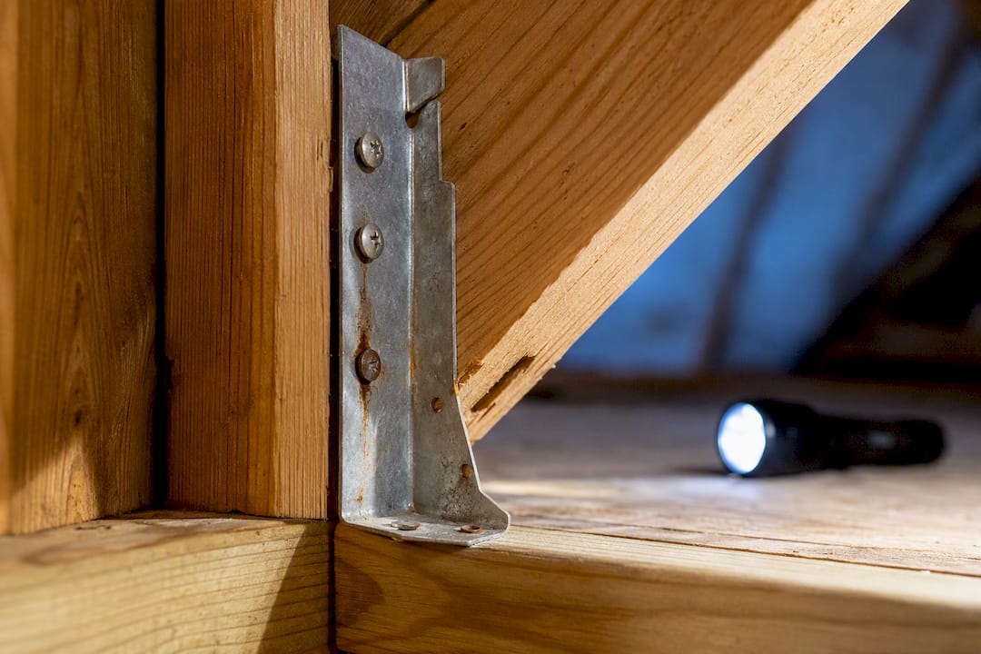 Rust streak on attic hurricane connector