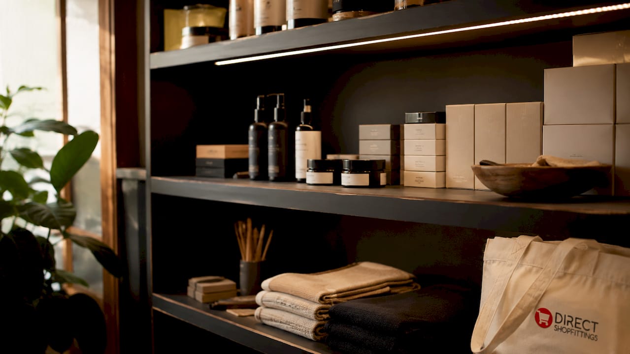 Close-up integrated retail shelf lighting detail