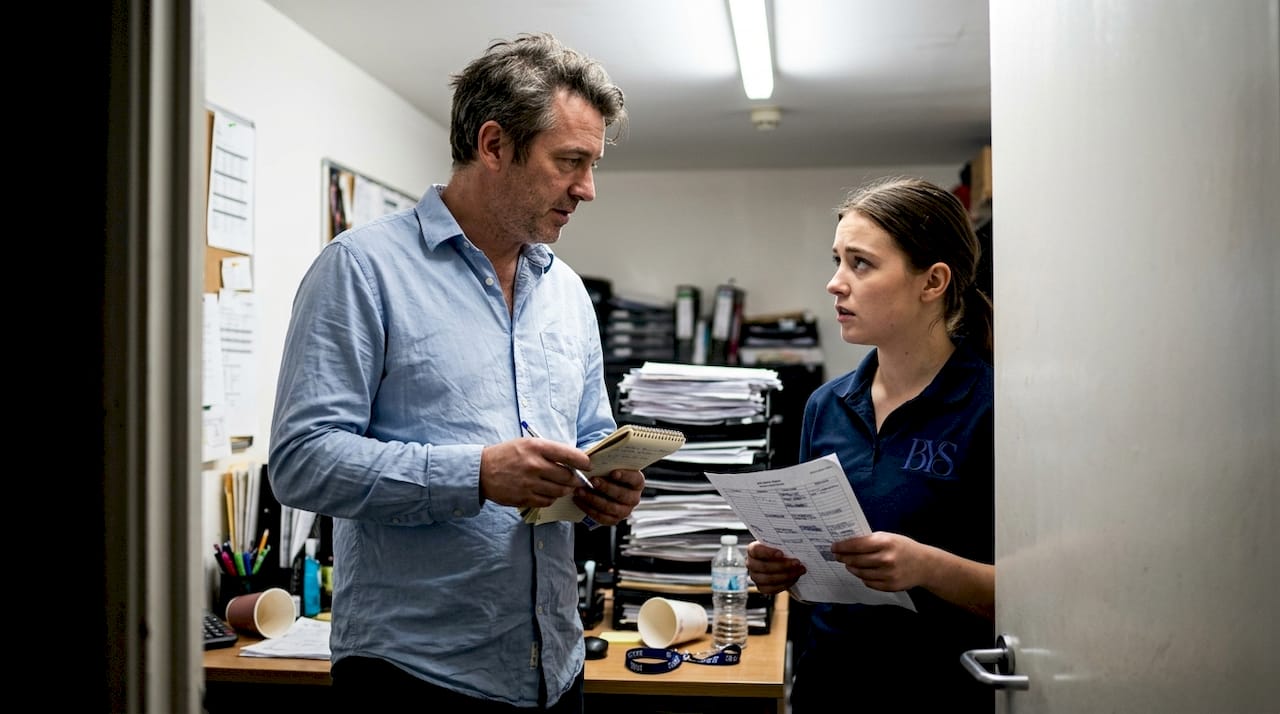 Manager and server discussing workplace retaliation