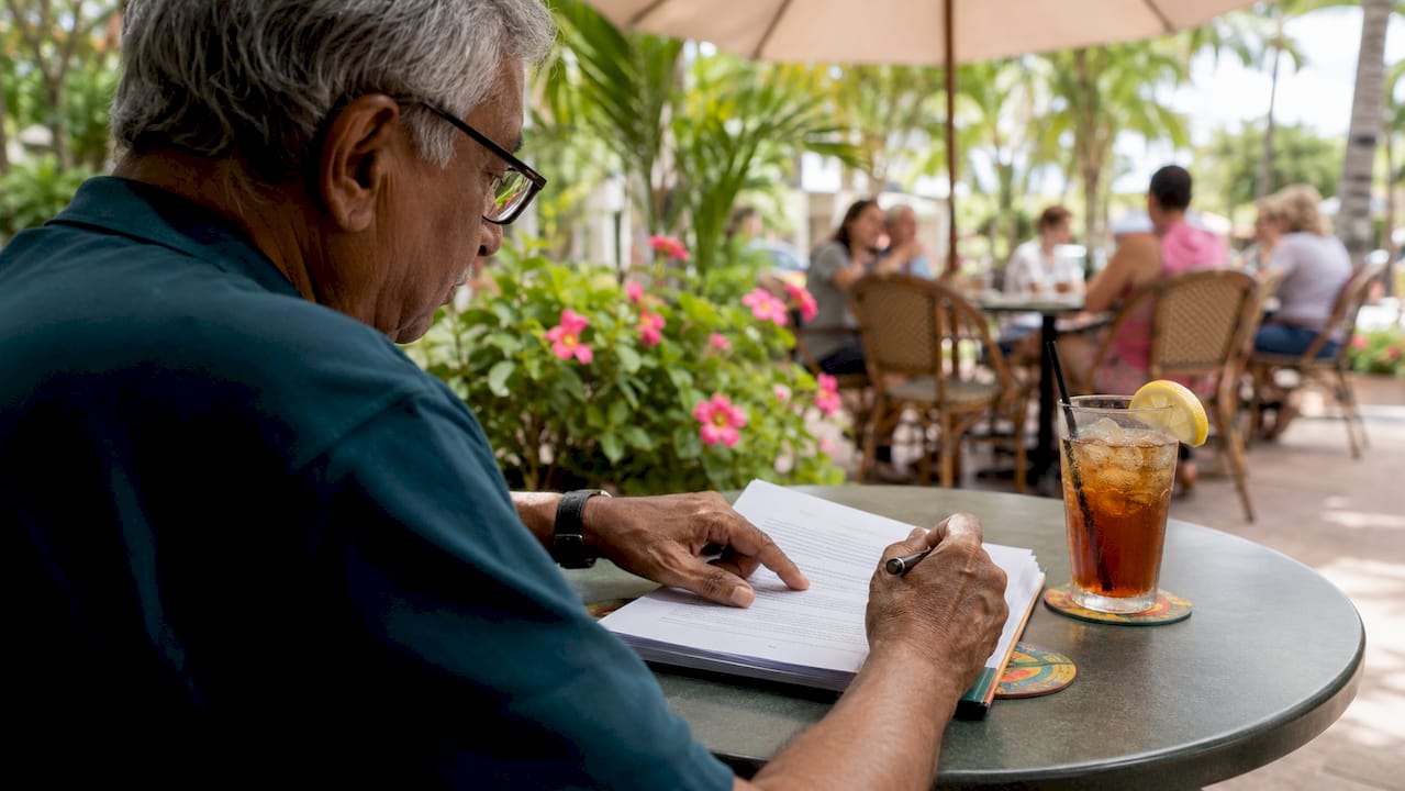 How to Understand Rental Agreements: 2026 Guide 2 Senior man highlighting rental agreement clause