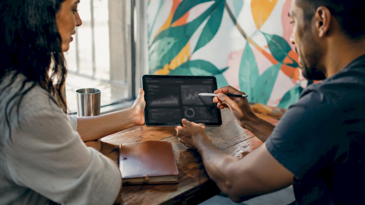 Hands interacting with luxury clienteling tech devices
