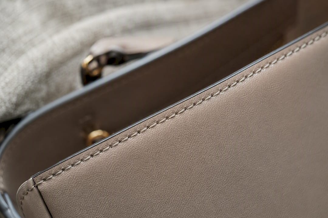 Macro shot of handbag stitching and edges