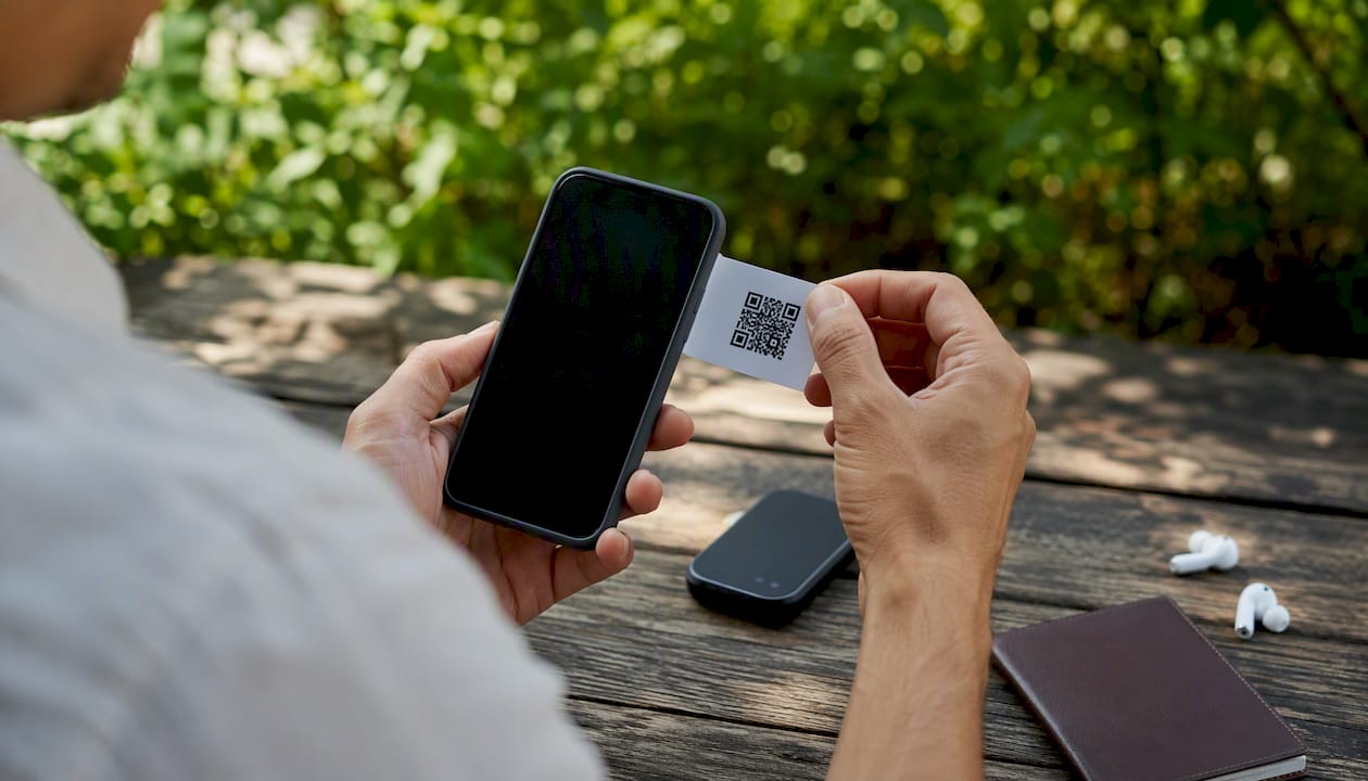 Traveler activating eSIM on phone