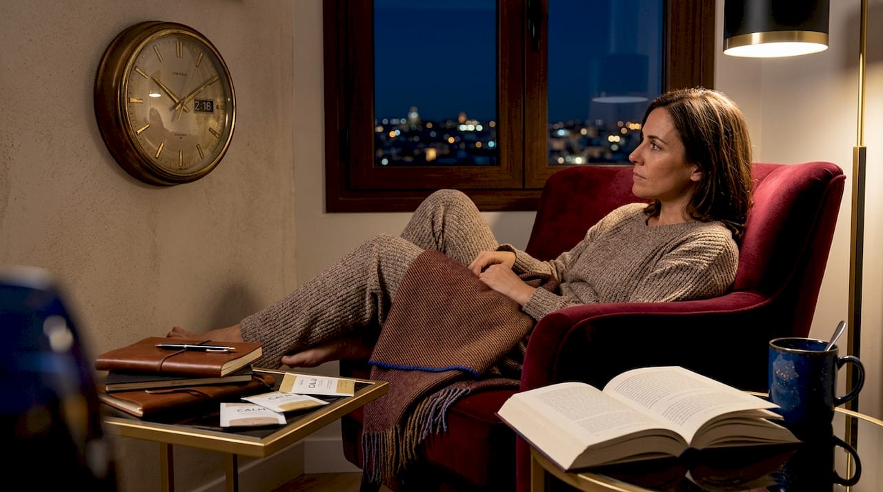 Woman awake late at night in Madrid bedroom