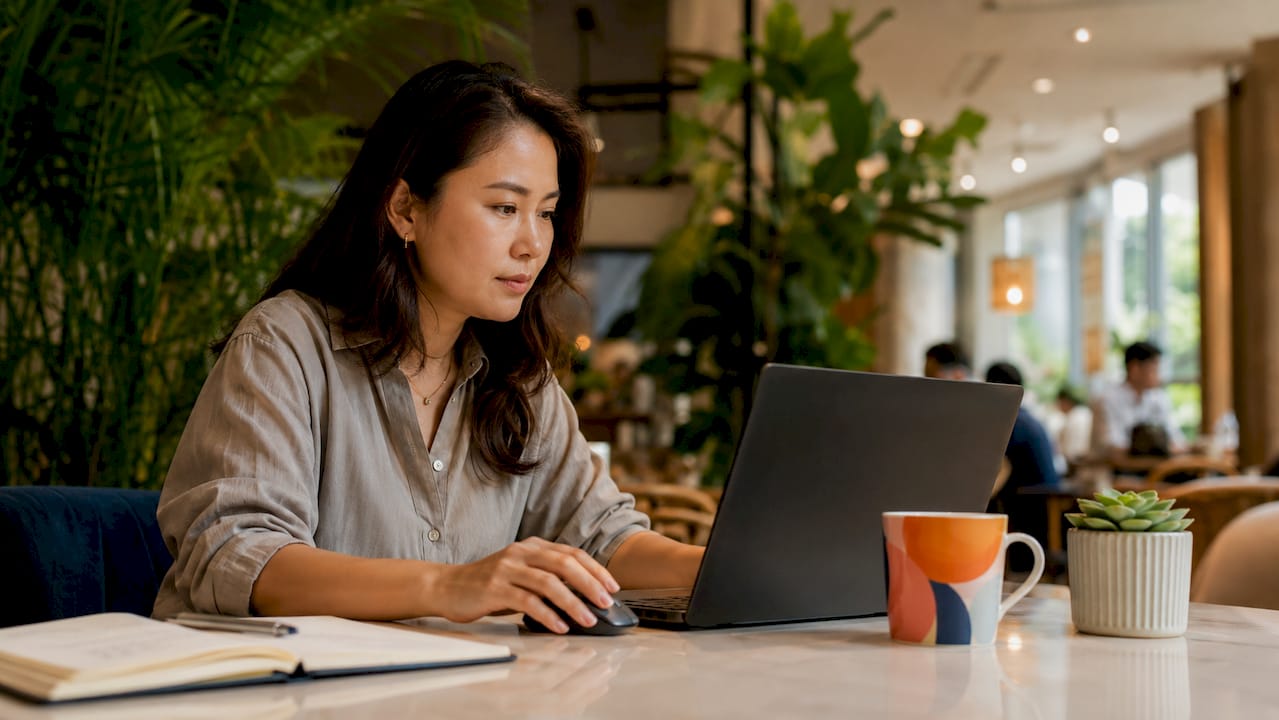 Woman managing retargeting ads at desk