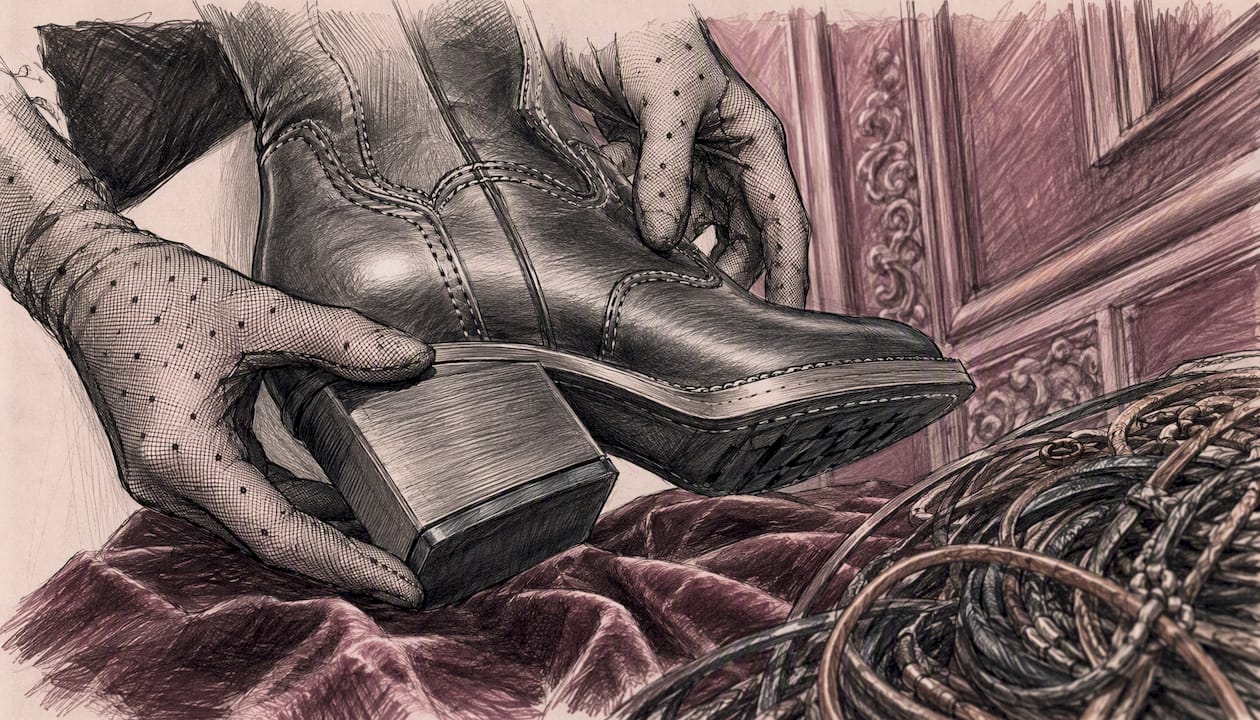 Hands adjusting roper boot heel