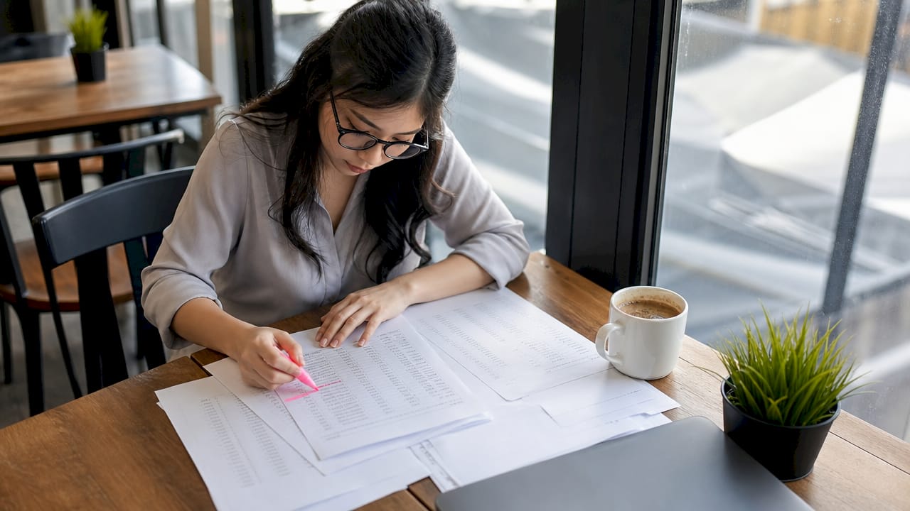 Mortgage advisor assessing borrower documents