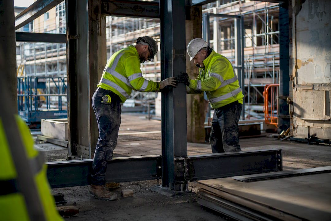 Construction site with steel beam installation