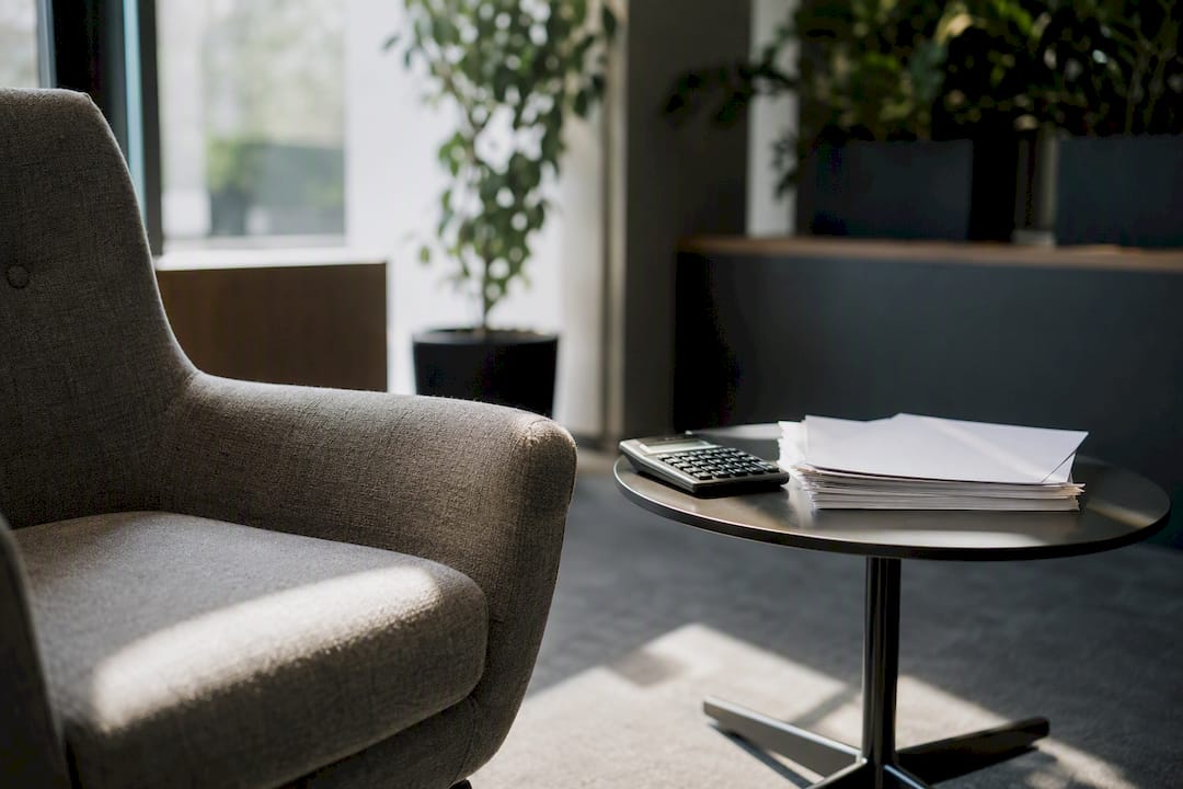Calculator and financial papers on desk