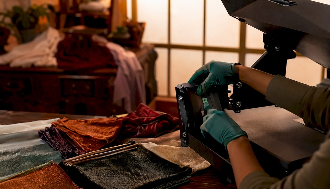 Close-up fabric samples and heat press controls