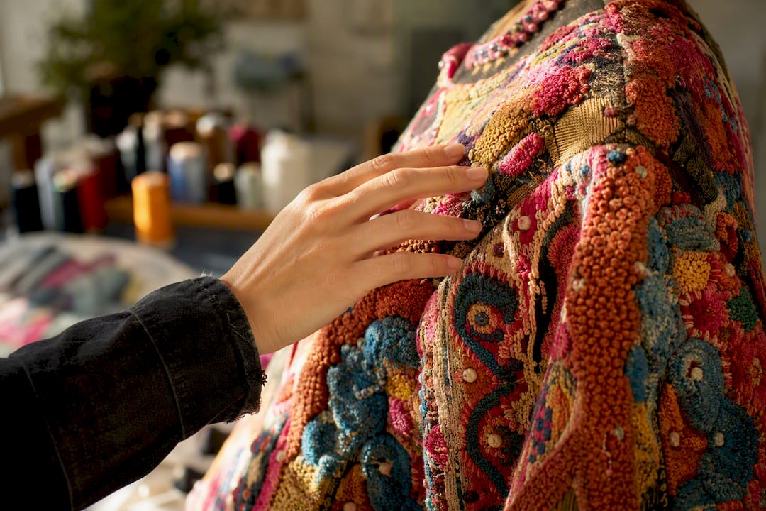 Textured apparel with chenille and embroidery accents