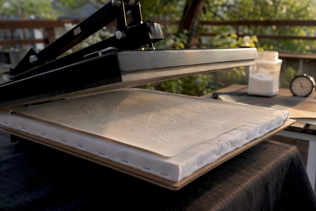 Canvas with powder before pressing