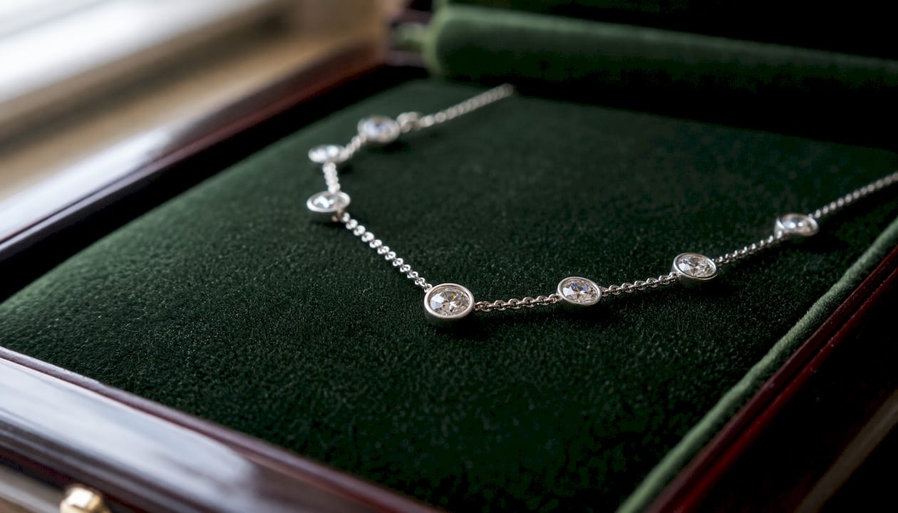 Close-up of bezel-set diamonds on elegant necklace