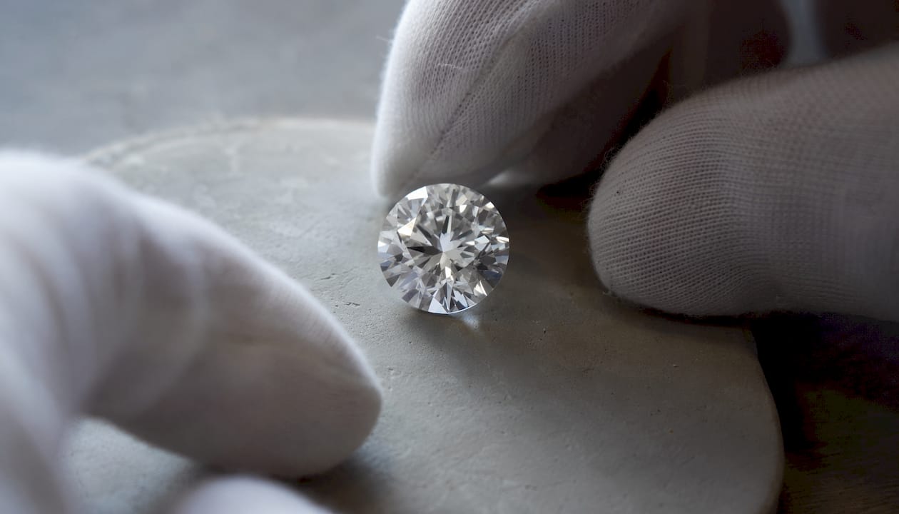 Close-up of round brilliant diamond facets