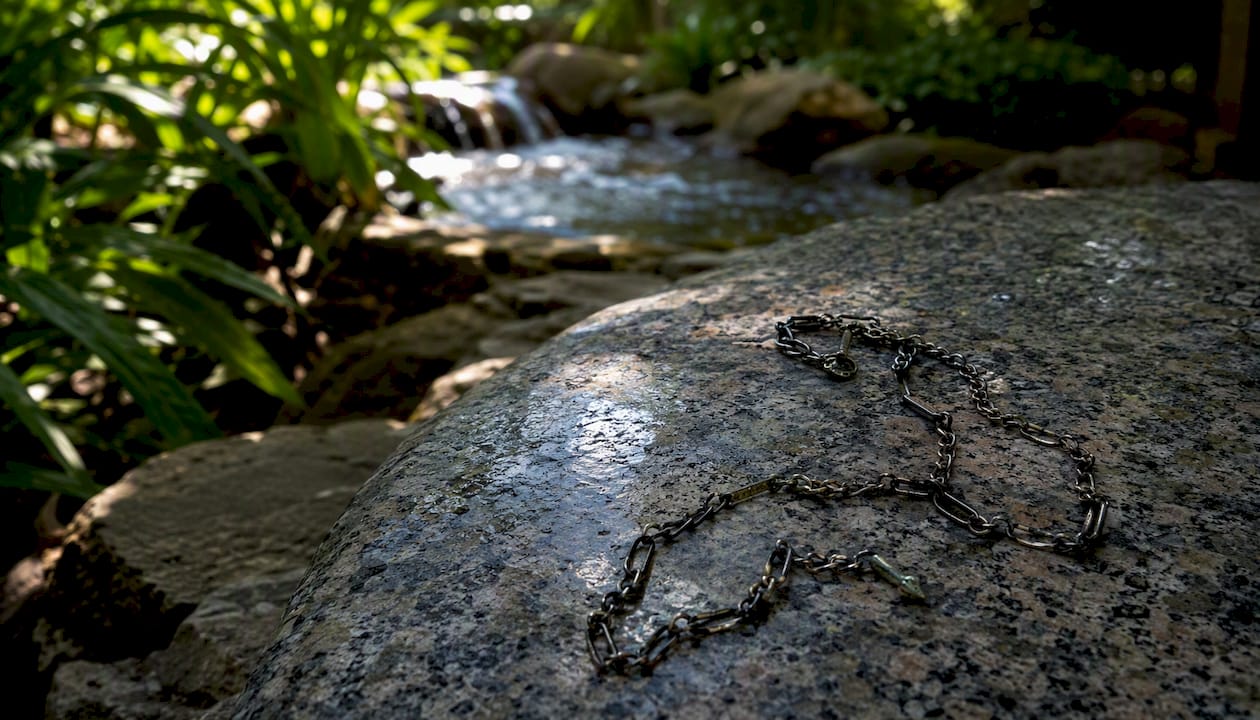 Close-up of silver necklace tarnished by chlorine