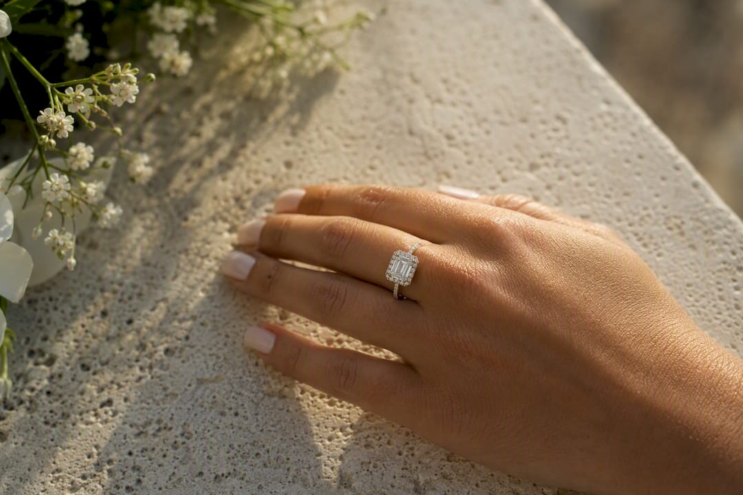 Emerald cut halo ring profile view