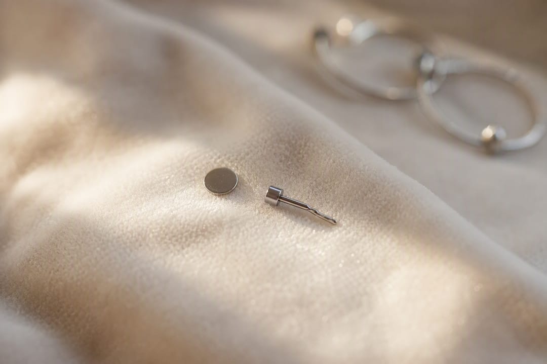 Close-up detail of flat-back and threadless earring posts