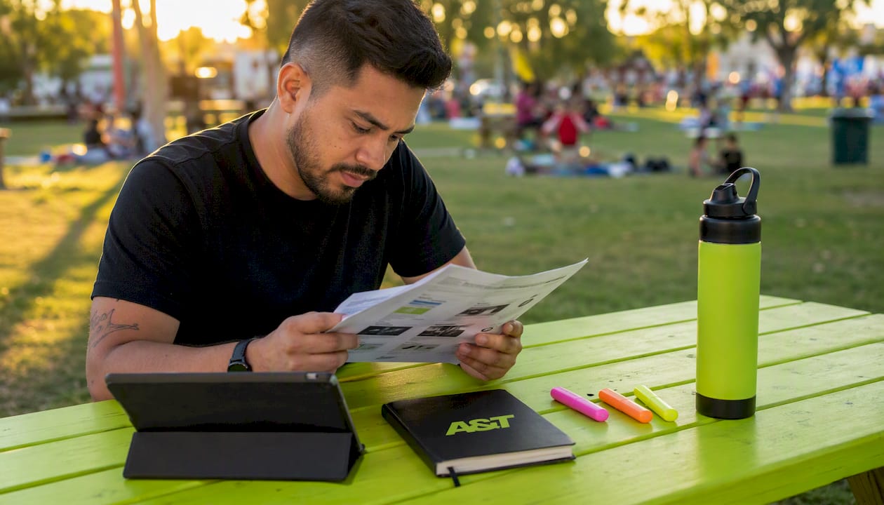 Event promoter reviewing media plans hands close-up