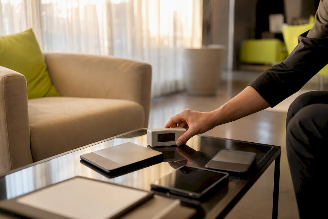 Hand setting timer on table