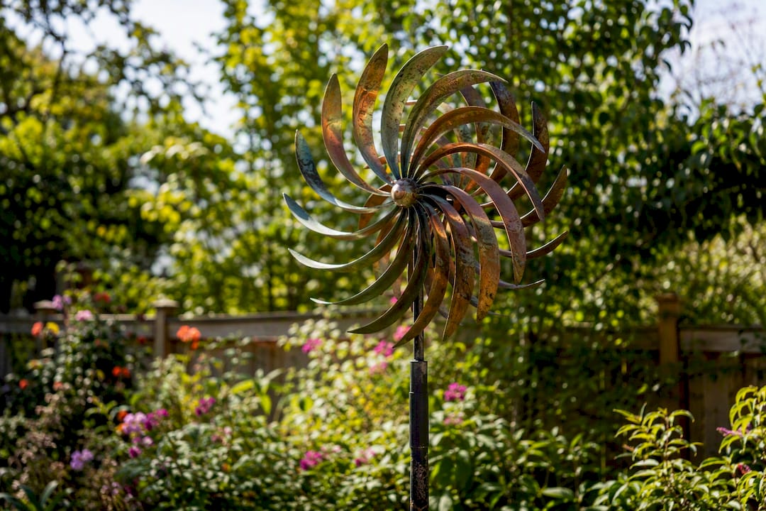 Wind spinner rotating in garden breeze