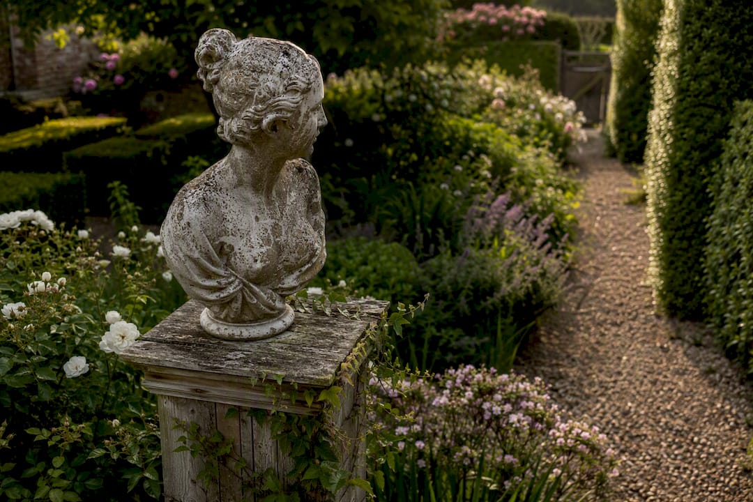 Single garden statue as focal point