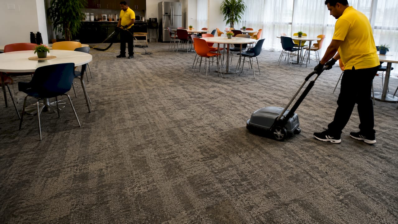 Close-up of gritty high-traffic commercial carpet fibers
