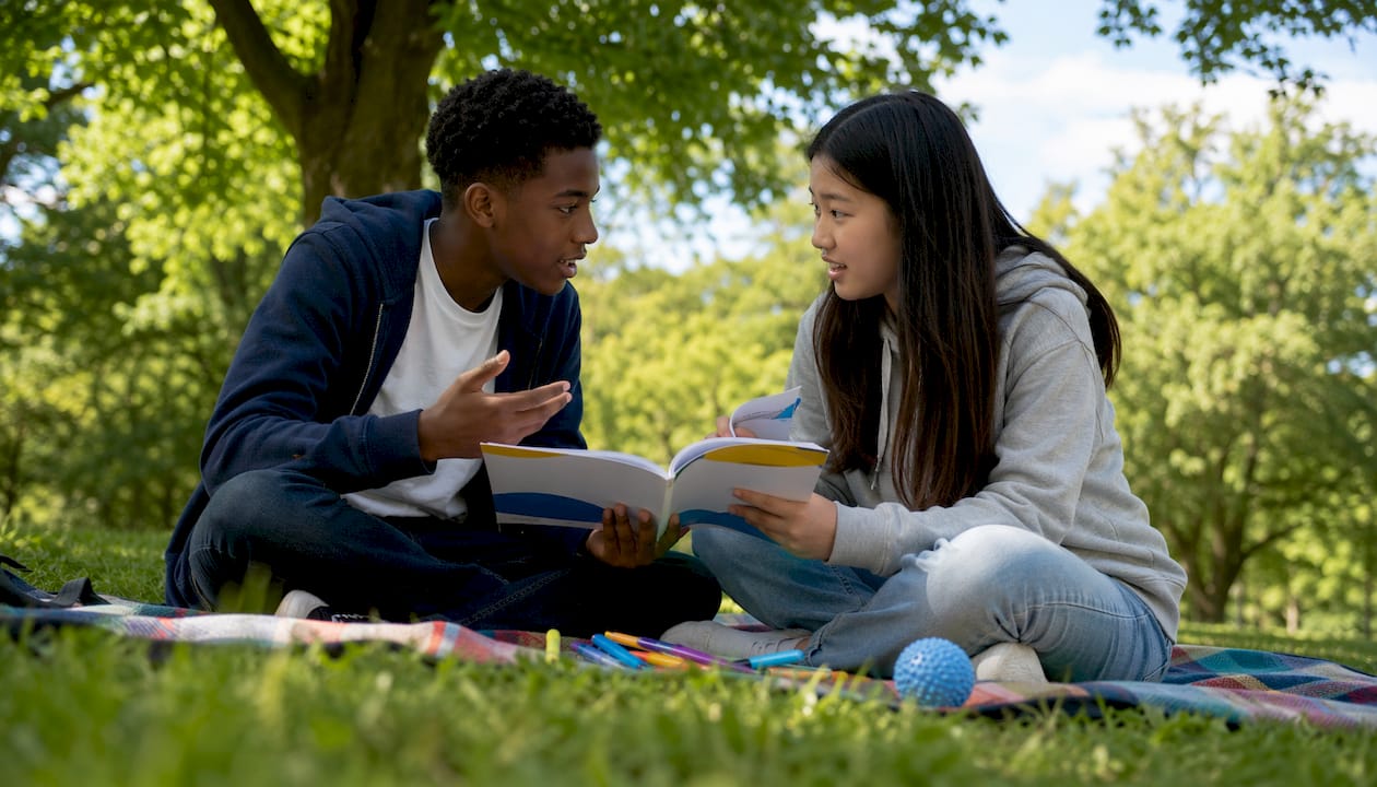 Two teens discussing coping strategies