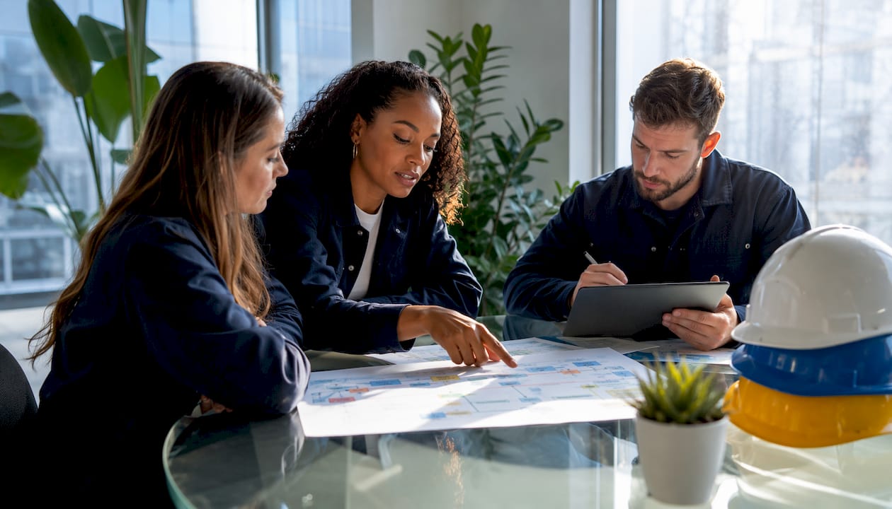 Engineers planning operations strategy in meeting