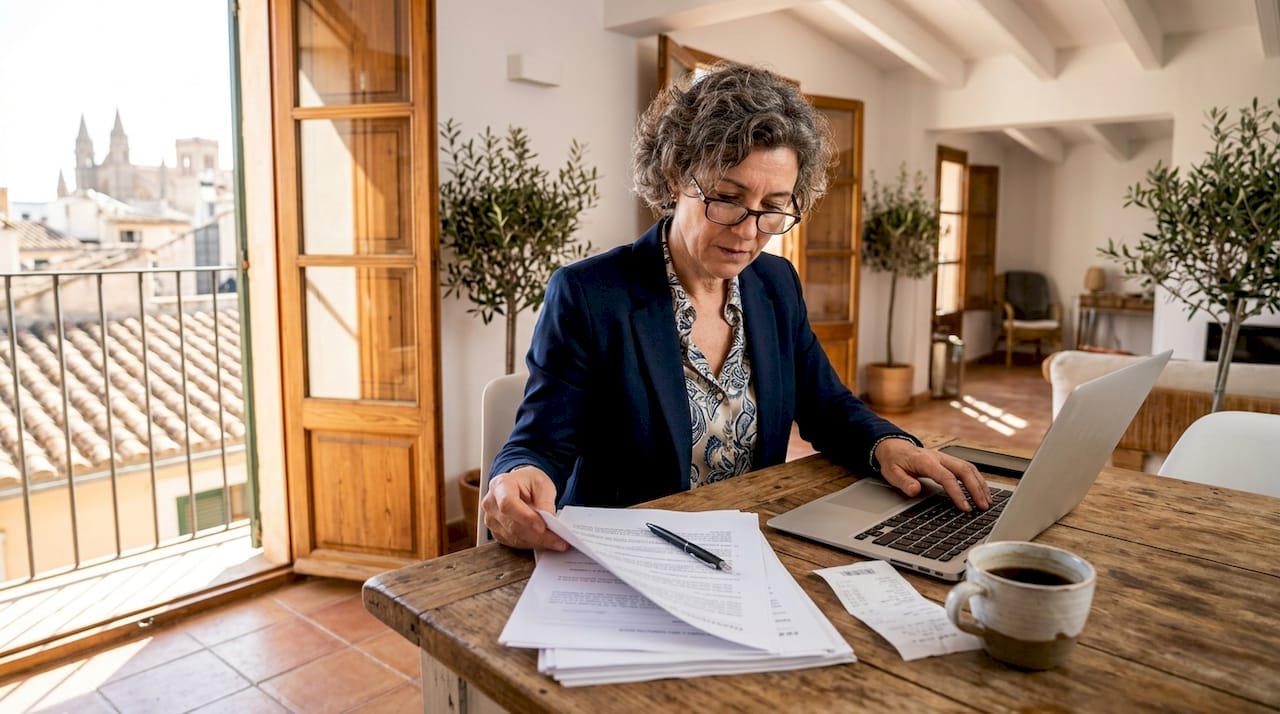Buyer reviewing Mallorca property registration documents