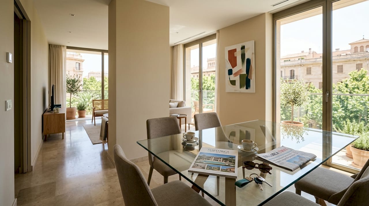 Luxury Palma apartment with couple reviewing brochure