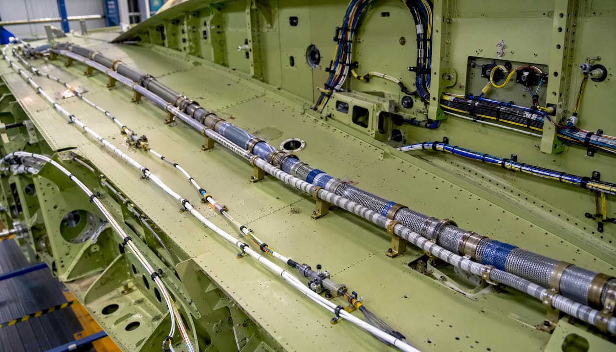 Flexible shaft installed in aircraft structure