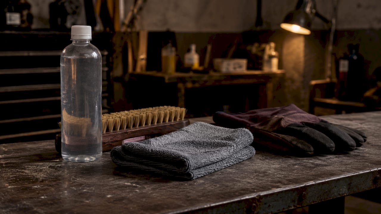 Close-up of stone sealer supplies on workbench
