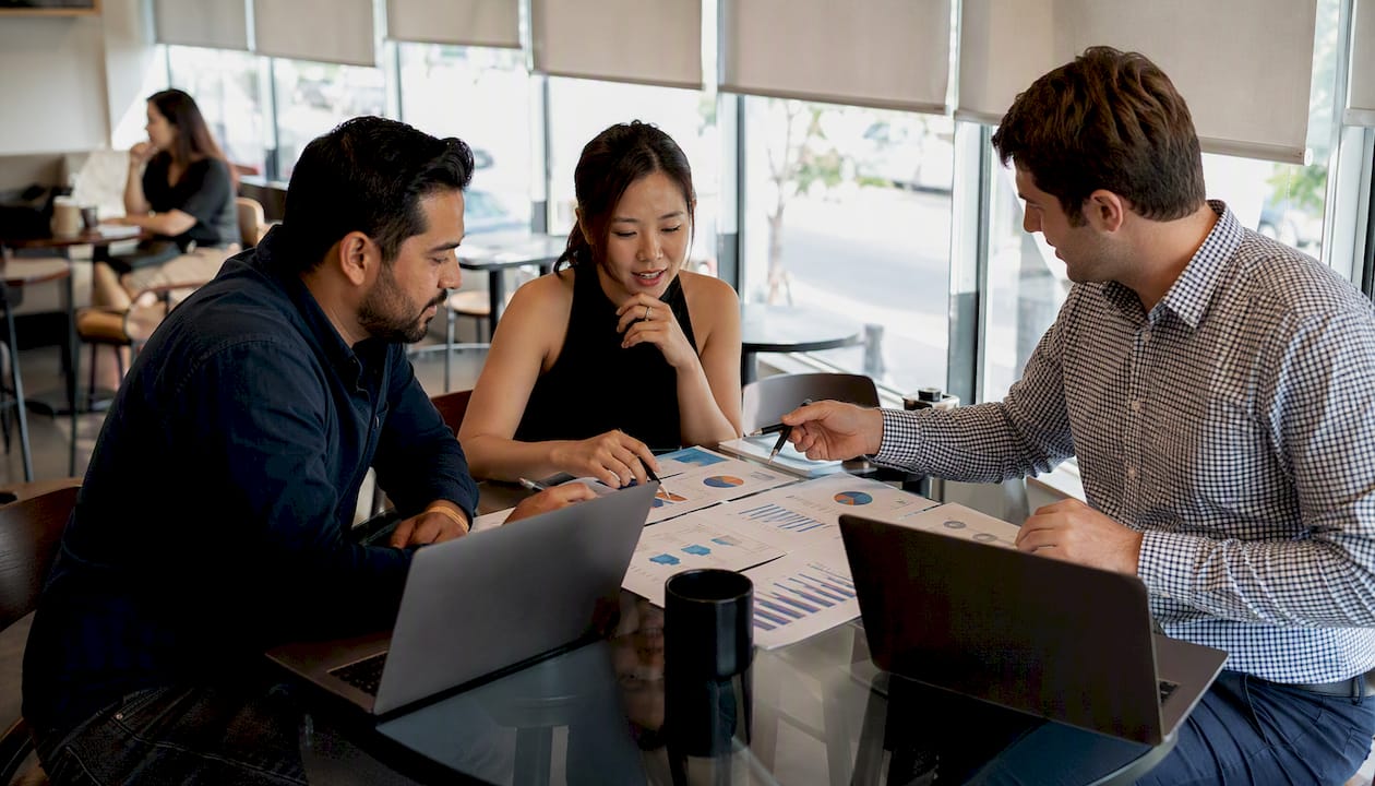 Sales team collaborating on email tracking analytics